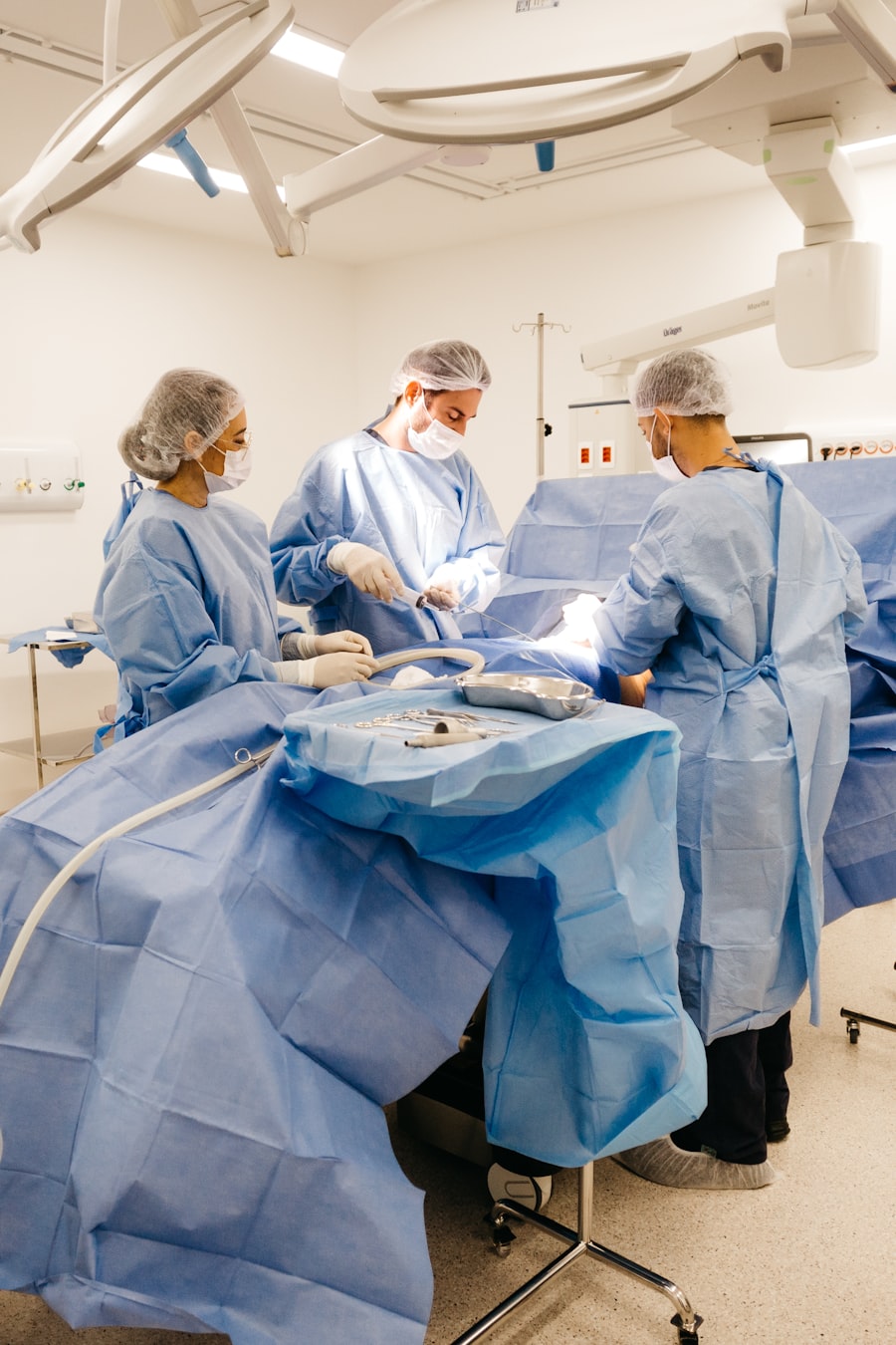 Surgical team operating in a hospital theatre